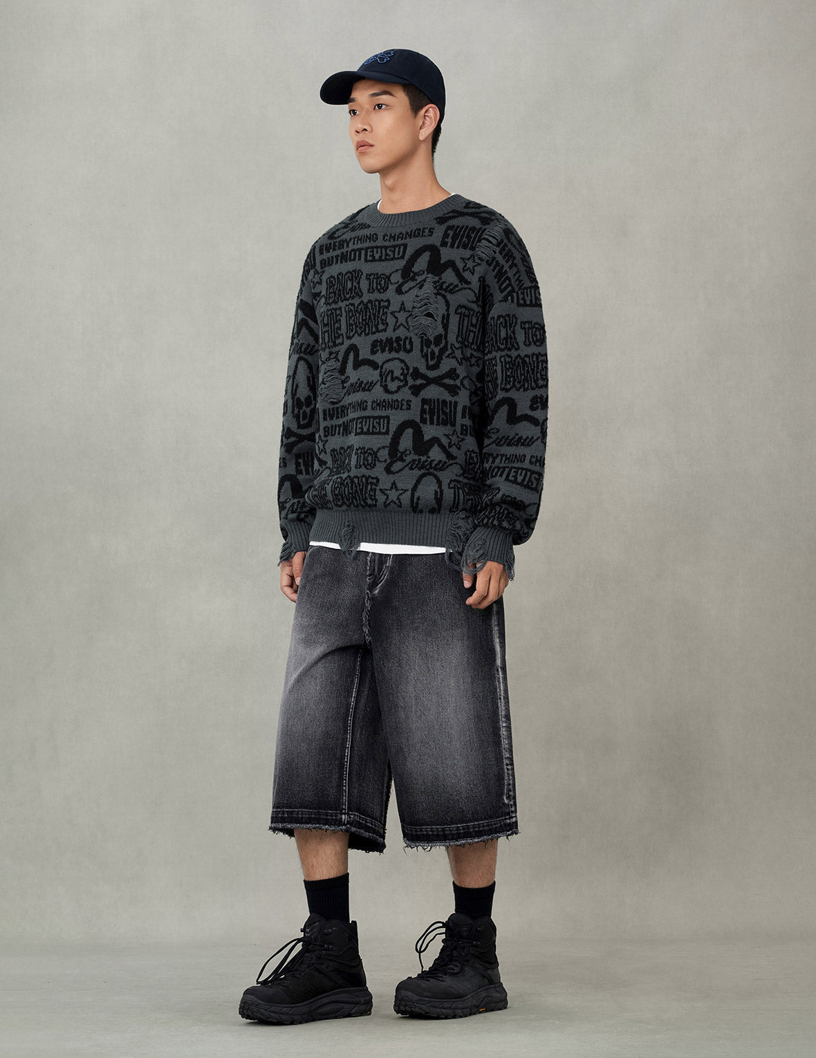 Allover Logos Jacquard Oversized Distressed Knit Sweater
